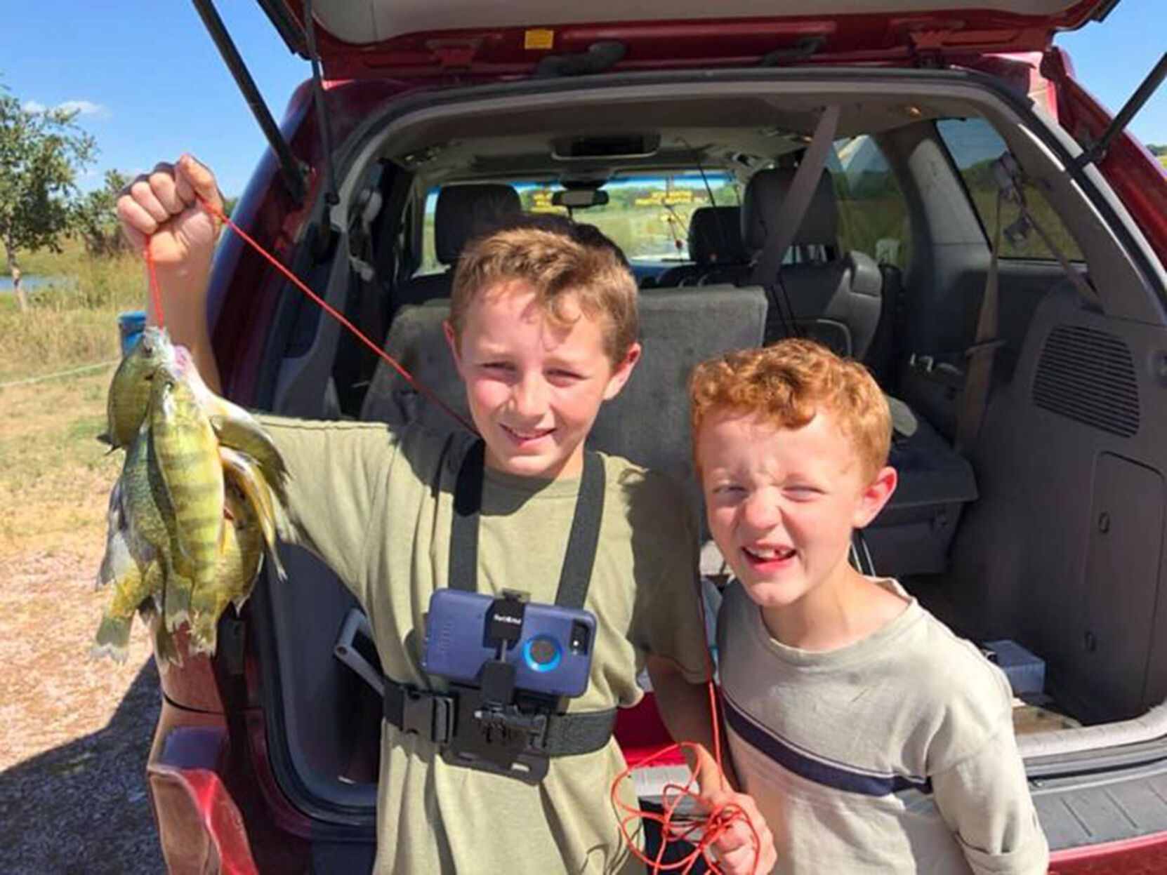Rose brothers hold up their catch